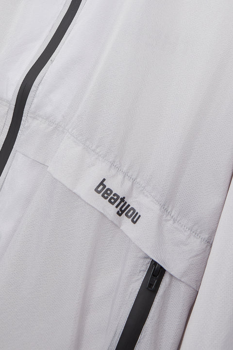 TECHNYLON™ ULTRALIGHTWEIGHT WINDBREAKER – CHALK